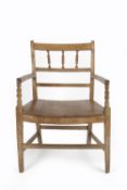 Arts and Crafts armchair, ash and elm 92cm high overall Provenance: Label to reverse of the chair