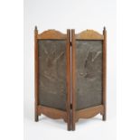 In the manner of Keswick School of Industrial Art fire screen, two copper panels in oak frame