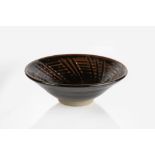 Marriane De Trey (1913-2016) bowl with iron glaze, impressed seal mark to the base 21cm across