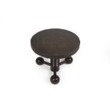 Charles Dudouyt (1903-1969) table, circular top on three ball feet, oak 59cm wide x 48cm high