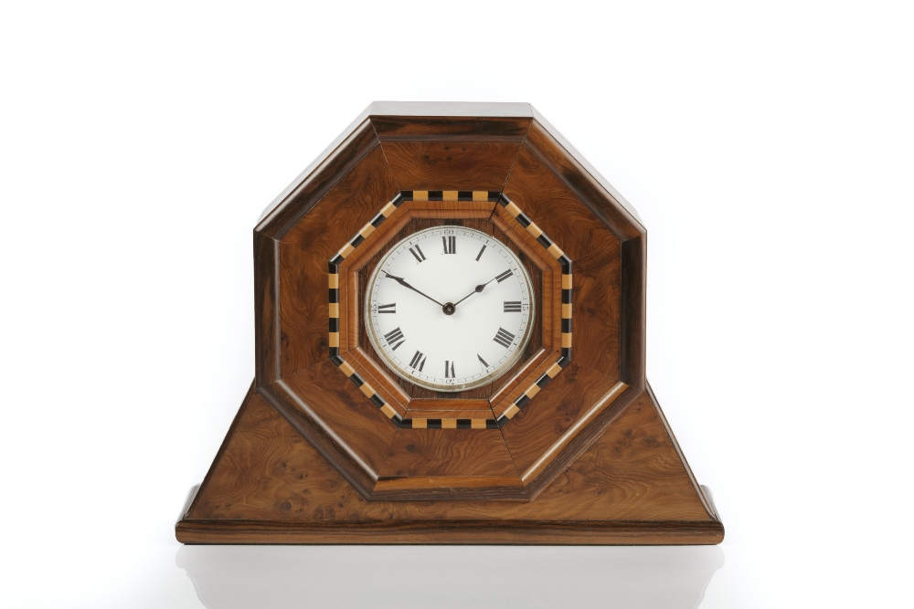 Attributed to Harry Davoll (British, 1876-1963) Cotswold School mantel clock, burr yew, white enamel