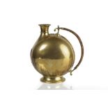 Christopher Dresser for Benham and Froud brass flask with wicker handle, circa 1885, unmarked 19.5cm