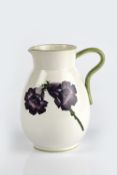 Wemyss pottery jug, decorated with Canterbury Bells, impressed mark to base 19cm high