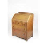 Attributed to Brynmawr bureau, oak, three short and two long drawers 84cm x 107cm x 48cm