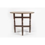 Heal & Son Ltd folding table, oak, with circular plaque to the table supports 76cm x 69cm x 61cm