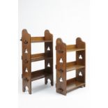 Liberty & Co two three-tier 'Sedley' bookcases, oak, Arts and Crafts period pegged shelves and cut
