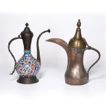 Two metal coffee pots Islamic, 20th Century, one with Iznik type body, 42cm and 45cm high.