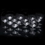 Set of fourteen champagne glasses pressed glass bowl with faceted stem, unsigned, 12cm high (14)