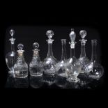 Pair of cut glass decanters Regency period, 21cm high and six other decanters