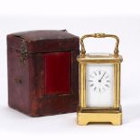 A. Dumas of Paris miniature carriage clock French, 19th Century, brass cased with white enamel dial,