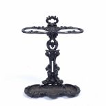 Cast iron stick stand 19th Century, of foliate form, 45cm across, 68cm high Provenance: Long