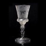 Glass goblet Bohemian, 19th Century, etched with arabesques, birds and figures. 28cm high.