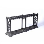 In the manner of Coalbrookdale large cast iron stick stand with foliate decoration, unsigned/