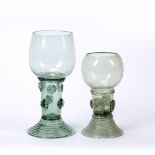 Two Dutch glass roemers 18th Century, green-tinted with hollow stems, applied prunts and spun