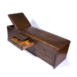 Mid 20th Century physicians bench pine with leatherette top, the base fitted with numerous