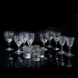 Collection of glass to include four etched wine glasses with floral motifs near the rim, three
