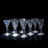 Group of eight similar large English wine glasses 18th/19th Century, each with tear-drop stem,