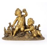 French gilt bronze model of two Putti 19th Century, modelled sitting in a garden, the largest