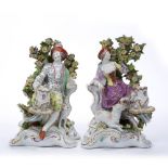 Pair of possibly Chelsea porcelain figure groups of the Shepherd and Shepherdess, gold anchor