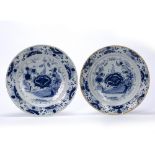 Pair of Delft blue and white pottery plates circa 1800, decorated in the Chinese manner, 26cm