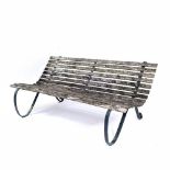 Garden bench with iron frame and wooden slats, 172cm across, 73cm high Provenance: Long Court,
