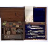 Cased technical drawing set handles marked 'Elliott', an early 20th Century artist's box, with