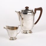 Silver coffee pot with angular trophy style handle, bearing marks for William Suckling Ltd,