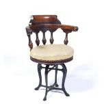 Mahogany swivel music chair 19th Century, on cast iron base, 55cm across, 86cm high Provenance: Long