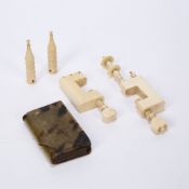 Pair of Victorian ivory knitting needle sheaths together a similar pair of sewing clamps, one with
