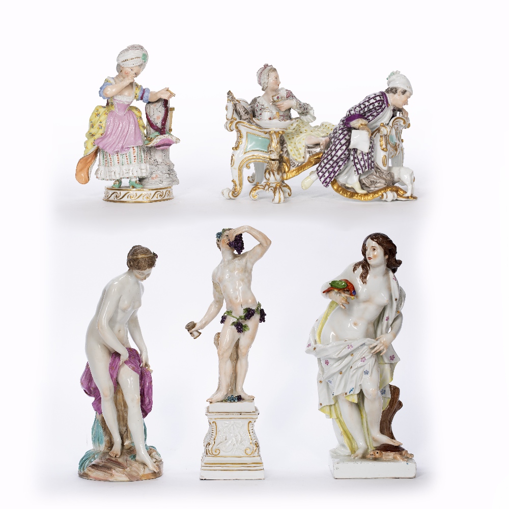 Group of five porcelain continental figures 19th/20th Century, to include two figures in a day bed
