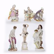 Group of five porcelain continental figures 19th/20th Century, to include two figures in a day bed