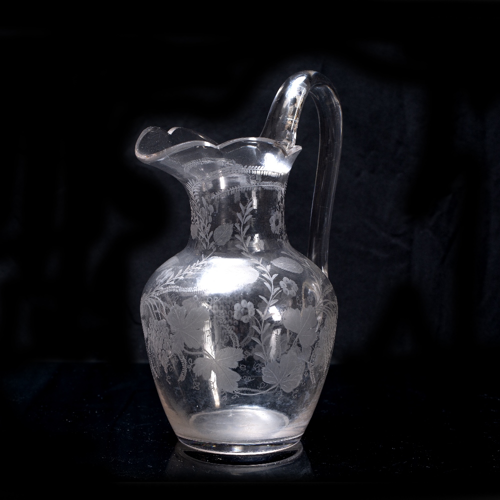Etched glass jug decorated to the body with flowers and grapes, with stylised rim, 25.5cm high - Image 2 of 2