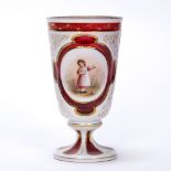 Bohemian overlay glass goblet circa 1850-70, pale ruby ground overlaid in white, cut with panels