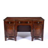 Mahogany and satinwood desk Edwardian, with bow front cupboards to the sides, 135cm across, 62cm