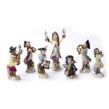 Collection of seven monkey band porcelain figurines in the Meissen style, all unmarked, the