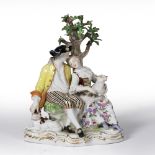 Meissen porcelain figure group depicting Shepherd and his wife sitting under a tree, marked to the