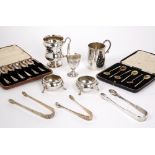 Collection of silver consisting of two cased sets of silver teaspoons, three pairs of silver sugar