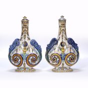 Pair of Gien pottery bottle vases late 19th Century, painted in polychrome colours with two satyr
