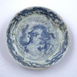 Blue and white porcelain large bowl Chinese, 18th/19th Century painted with dragons and stylised