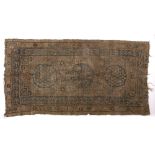 Khotan rug Chinese with three central roundels, 239cm x 122cm