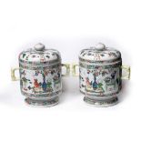 Pair of porcelain pots and covers Chinese, 19th Century with famille verte decoration and Buddhist