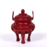 Cinnabar lacquer covered censer Chinese carved in relief with birds and symbols, with two