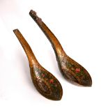 Two Qajar wooden spoons Iran, 19th Century decorated with early Qajar colouring and patterns, 24cm