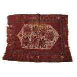 Afshar red ground rug with central ivory ground panel and geometric and foliate border, 154cm x