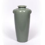 Celadon Longquan vase Chinese, late Ming (1368-1644) of tapering form with mask head mounts to the