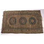 Khotan rug Chinese with three central roundels, 210cm x 126cm