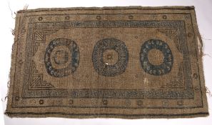 Khotan rug Chinese with three central roundels, 210cm x 126cm