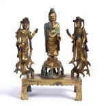 Gilt bronze altarpiece Chinese cast in the Sui dynasty style with central buddha and two attendant