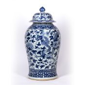 Blue and white baluster vase Chinese, 19th Century decorated to the body with dragons and leafy