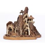 Wooden model of a mountain village Japanese, early 20th Century with ivory or bone trees and